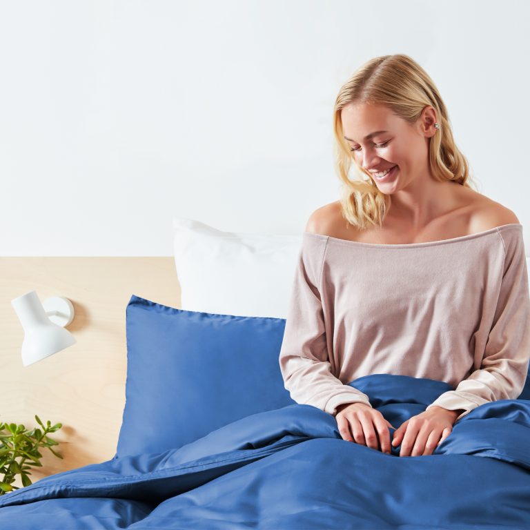 Woman In Bed With Panda London 100 Bamboo Bedding In Deep Sea Navy